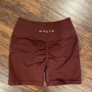 NVGTN wine colored red bike gym shorts with butt scrunch women’s ladies M